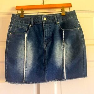 Size large cute denim skirt with vintage look. Cute for concerts.